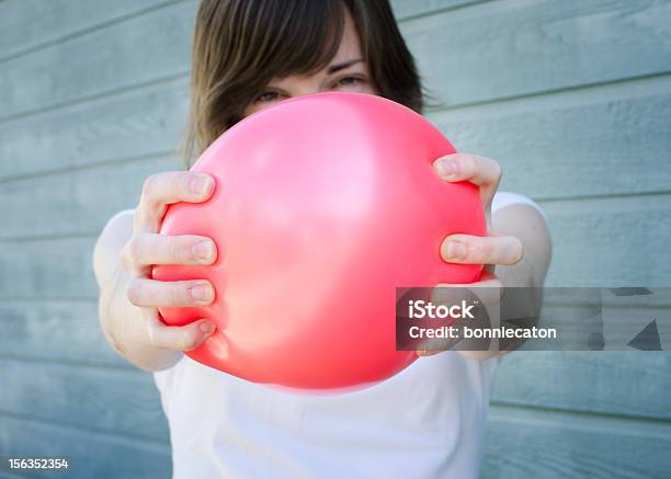 Squeezing Red Balloon Stock Photo - Download Image Now - Balloon, Exploding, Physical Pressure
