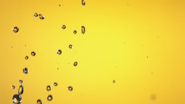 Flying of Lemon in Yellow Background in Slow Motion