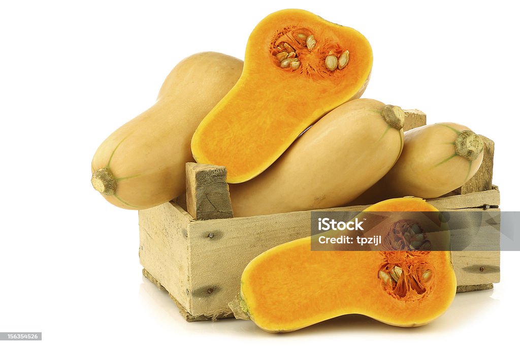 En forma de botella y dos mitades de calabaza pumpkins - Foto de stock de Alimento libre de derechos