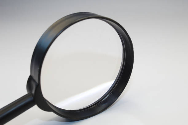 istock Magnifier for use in reading or research 1563558392