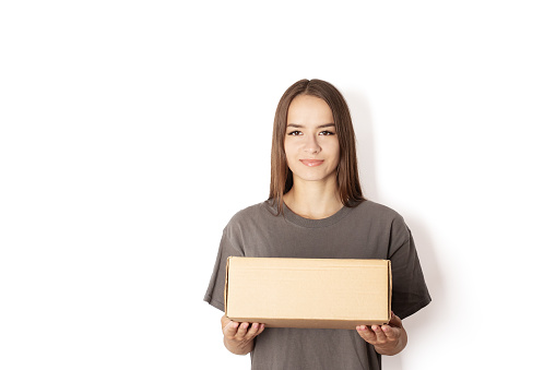 courier delivery express, girl courier with a box parcel on a white background, online orders of goods, postal service,
