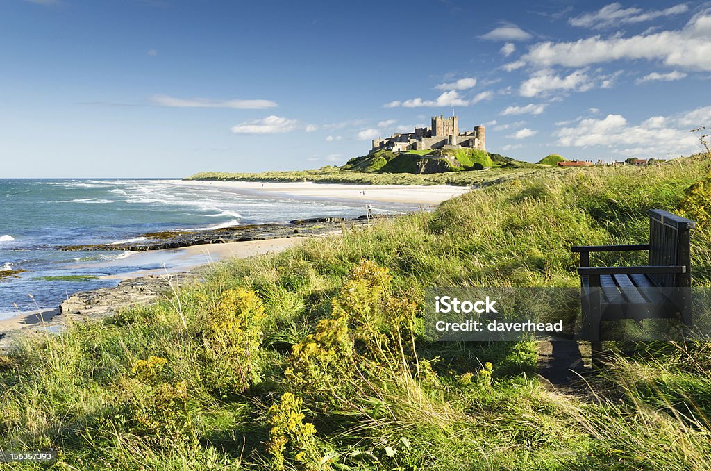 Bamburgh Castle and seat Bamburgh Castle taken here from the north dates back to the 6/7th century Bamburgh Stock Photo