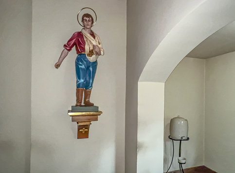 Kalety, Poland, June 23, 2023: The figure of St. Isidore, patron of farmers, depicted as a sower, in the parish church of St. Francis of Assisi in Kalety Miotek in Poland.