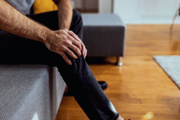 istock An unrecognizable man holding his injured knee 1563626963
