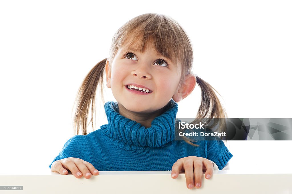 Little girl looking up Little girl looking up, isolated on white Cheerful Stock Photo