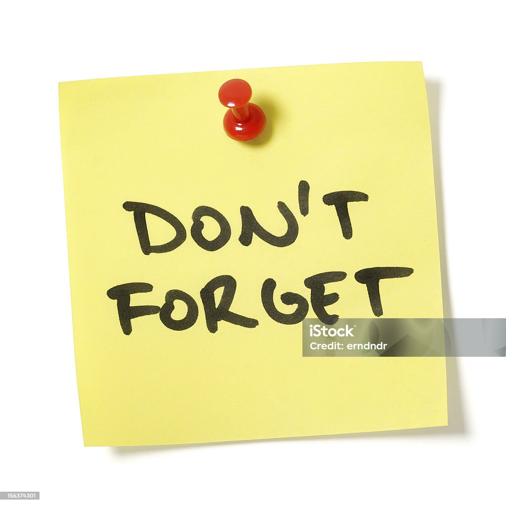 Don't Forget Note Blank yellow sticky note written on "Don't Forget" with red push pin. Isolated on white background with clipping path. Reminder Stock Photo
