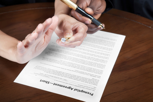 woman refusing to sign a prenuptual agreement giving back the diamond engagement ringwoman refusing to sign a prenuptual agreement 