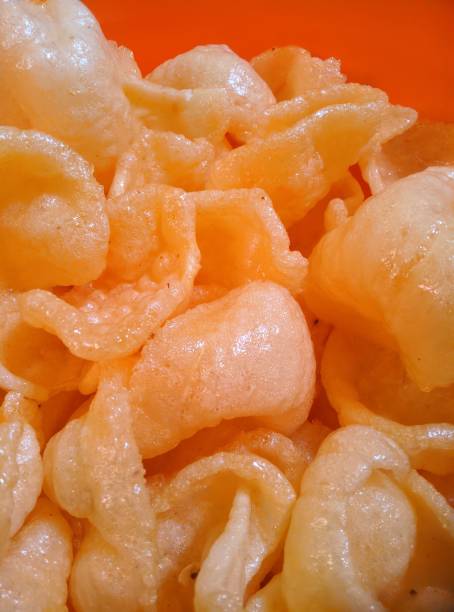 istock oily and crunchy pink crackers for lunch 1563881023