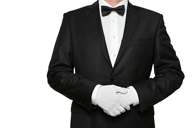 at your service - first class butler white glove 뉴스 사진 이미지