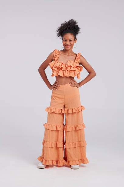 istock Fashion Icon: Black Thai-American Woman's Studio Fashion Shoot 1563984035