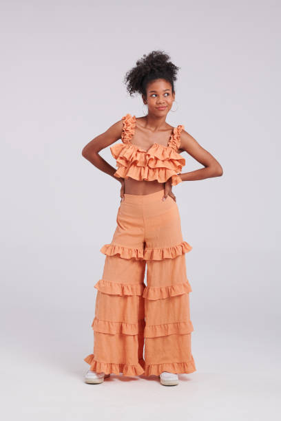 istock Runway Ready: Black Thai-American Woman's Studio Fashion Capture 1563985452