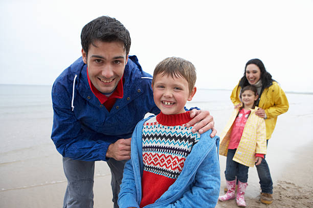 istock Happy family on beach 156398731