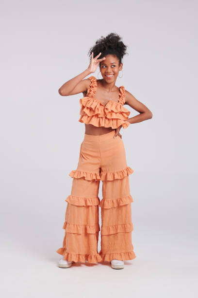 istock Stylish Fusion: Black Thai-American Woman's Fashionable Pose 1563989305