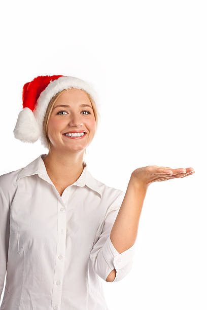young girl in santa hat.スタジオで白 - young women one young woman only smiling cheerful ストックフォトと画像