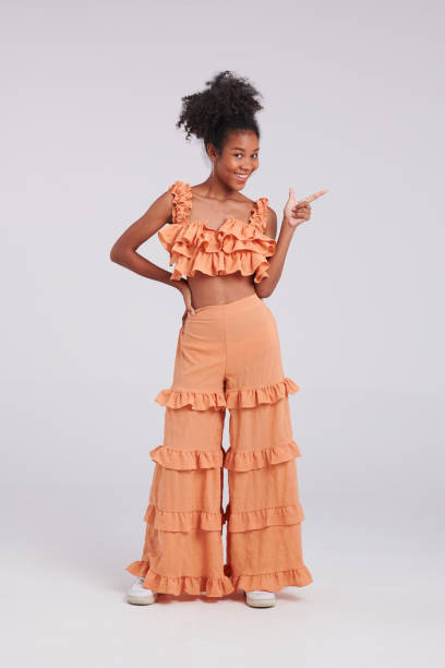 istock Chic and Confident: Black Thai-American Woman's Fashion Shoot 1564005388