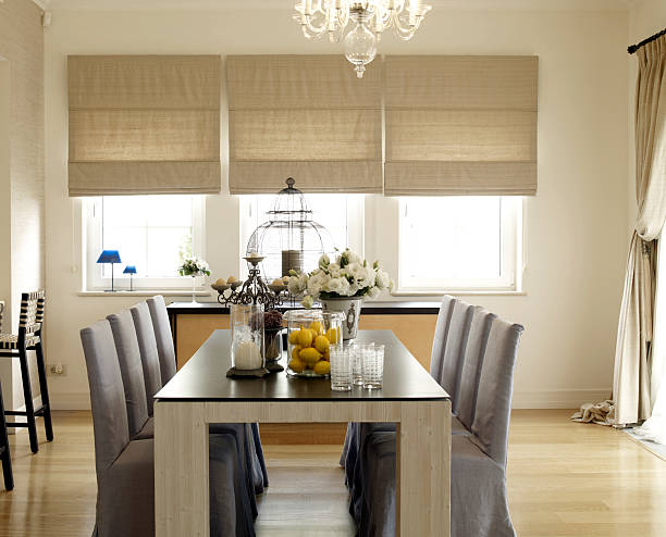 Dining table Living dining room of a modern house window blinds photos stock pictures, royalty-free photos & images