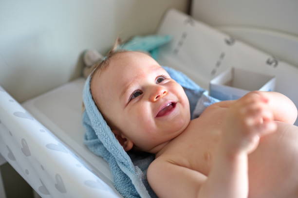 istock Little boy wrapped in a towel 1564065676