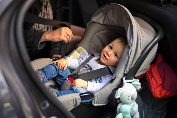 istock Little boy sitting in a car 1564065701