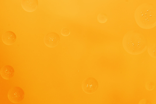 Yellow liquid bubble texture background