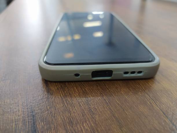 istock Broken cell phone on a brown wooden table 1564174273