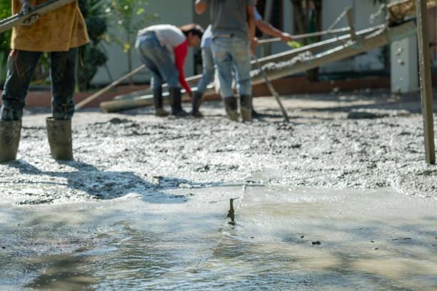 istock Workers are pouring, concrete and equipment 1564224103