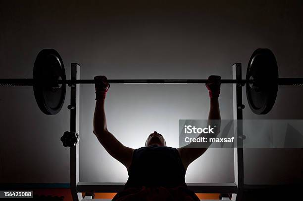 Man Weightlifter At The Gym Stock Photo - Download Image Now - Bench Press, Weight Bench, Health Club