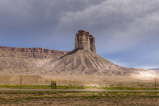 The dramatic Chimney Rock butte and bluff rock formation during the day. On highway 491 near Cortez Colorado, United States