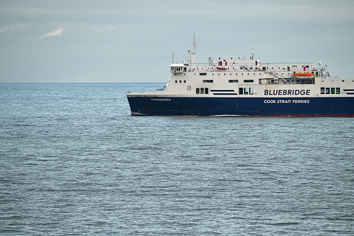 Wellington, New Zealand, May 19, 2023:The Bluebridge ferry Connemara crossing Cook Strait to Wellington, as seen from the Interislander ferry Atarere