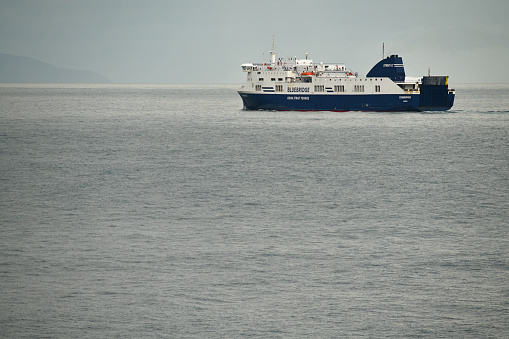 Wellington, New Zealand, May 19, 2023:The Bluebridge ferry Connemara crossing Cook Strait to Wellington, as seen from the Interislander ferry Atarere