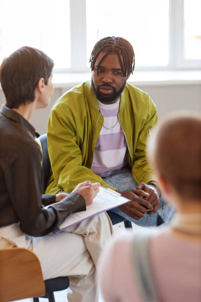 istock People talking to psychologist at session 1564403651