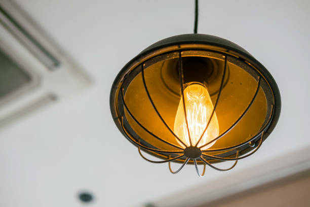 istock Hanging Edison light bulb, also known as filament light bulb 1564411710