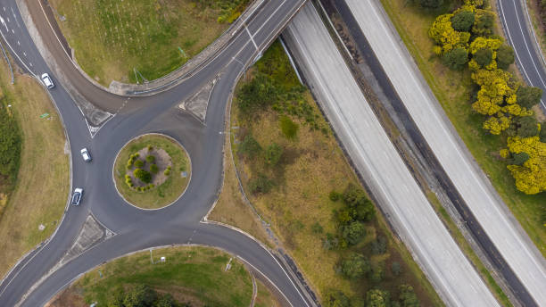 istock Aerial View of a Roundabout at a Motorway Junction 1564458983