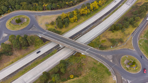 istock Aerial View of a Roundabout at a Motorway Junction 1564458990