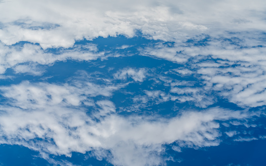 View of clouds from the window of a jet aircraft. Concept travel.