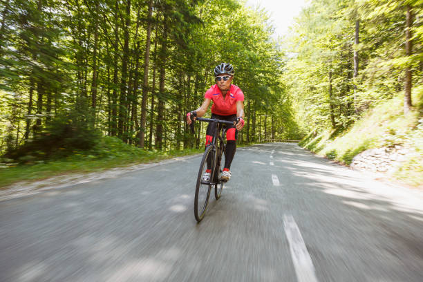 istock Female cyclist portrait 1564528342