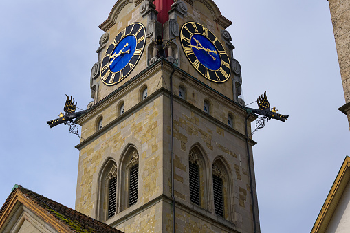Zurich, Switzerland: clock tower of St. Peter Church, St. one of the three old town churches that characterize the silhouette of Zurich. It is located on a hill in the old town on the left bank near the Lindenhof, where the Roman settlement of Turicum and the imperial palace were located. The tower is older than today's church and already had its current shape around 1500.