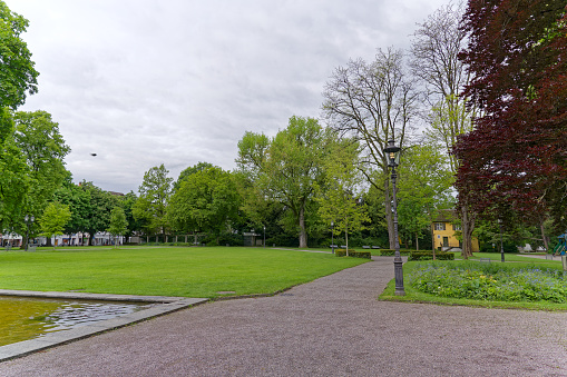 Beautiful public park at Swiss City of Winterthur on a cloudy spring day. Photo taken May 17th, 2023, Winterthur, Switzerland.
