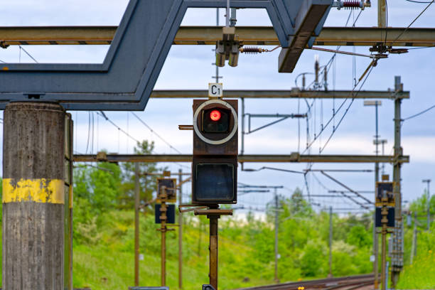 istock Railway track with railway signals at Swiss train station. 1564599077