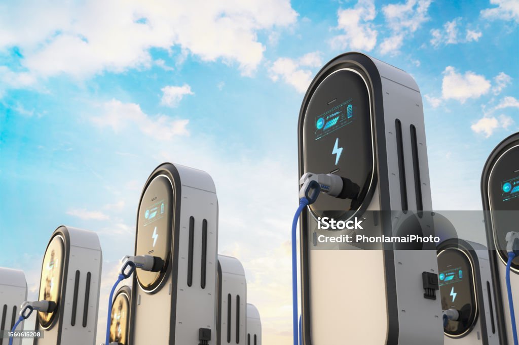 EV charging stations or electric vehicle recharging stations with graphic display 3d rendering group of EV charging stations or electric vehicle recharging stations with graphic display Electric Vehicle Stock Photo