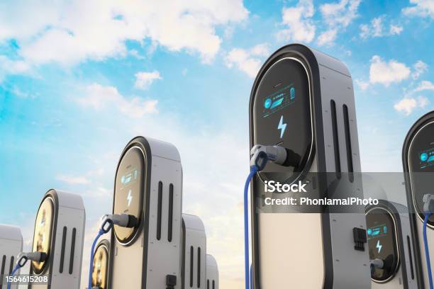 Ev Charging Stations Or Electric Vehicle Recharging Stations With Graphic Display Stock Photo - Download Image Now