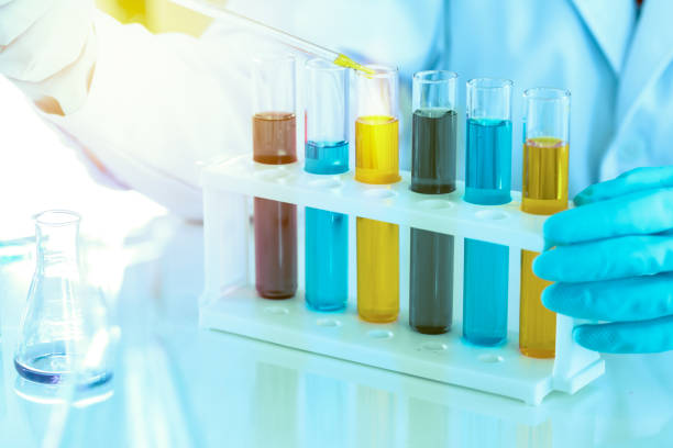 istock scientist with equipment and science experiments, laboratory glassware containing chemical liquid for research or analyzing a sample into test tube in laboratory 1564627045