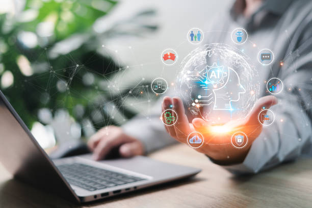 istock Business work and AI technology concept,Businessmen show AI technology in hand artificial intelligence to generate something in daily life,Data management convenience modernity in the modern world. 1564679495