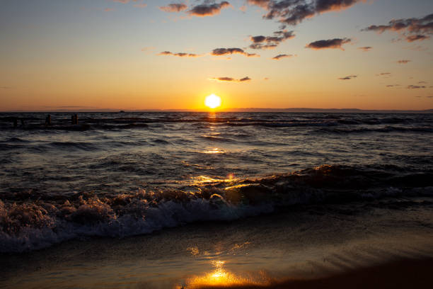 istock Lake Baikal waves in sunset 1564698670