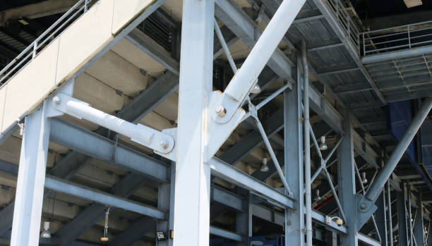 istock Detail of architectural steel structure hinges and fixed pin connection joint. 1564699262