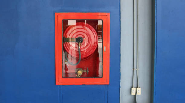 istock Fire hose cabinet in the building. 1564699812