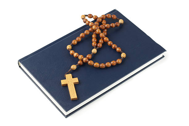 istock Holy Bible and rosary breads 156470402