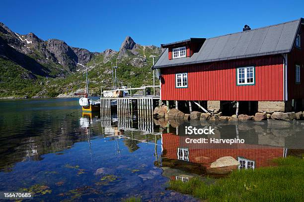 Fishing Hut Reflecting In Fjord Stock Photo - Download Image Now - Austvagoy, Coastline, Europe