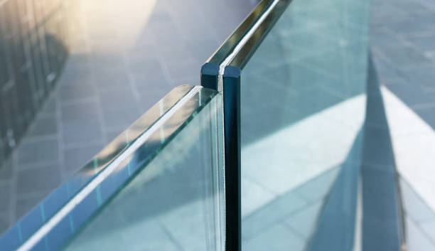 istock Closeup frameless laminated glass railing outdoor. 1564715712