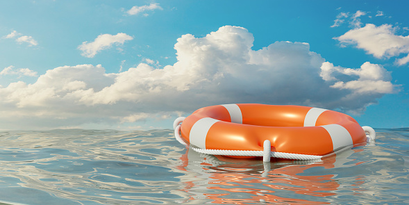 Lifebuoy on blue rippled ocean, blue cloudy sky background. Orange color life buoy, marine safety. 3d render