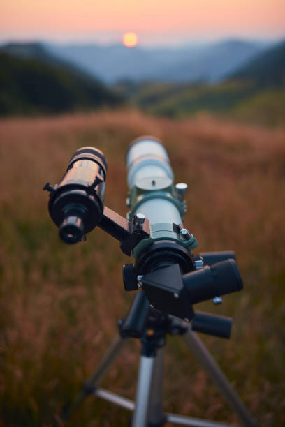 istock Astronomical telescope for observing planets, Moon, Sun, stars, comets and other celestial objects. 1564795393